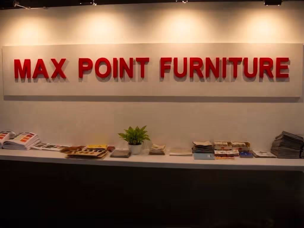 Max Point Furniture signage in the company showroom